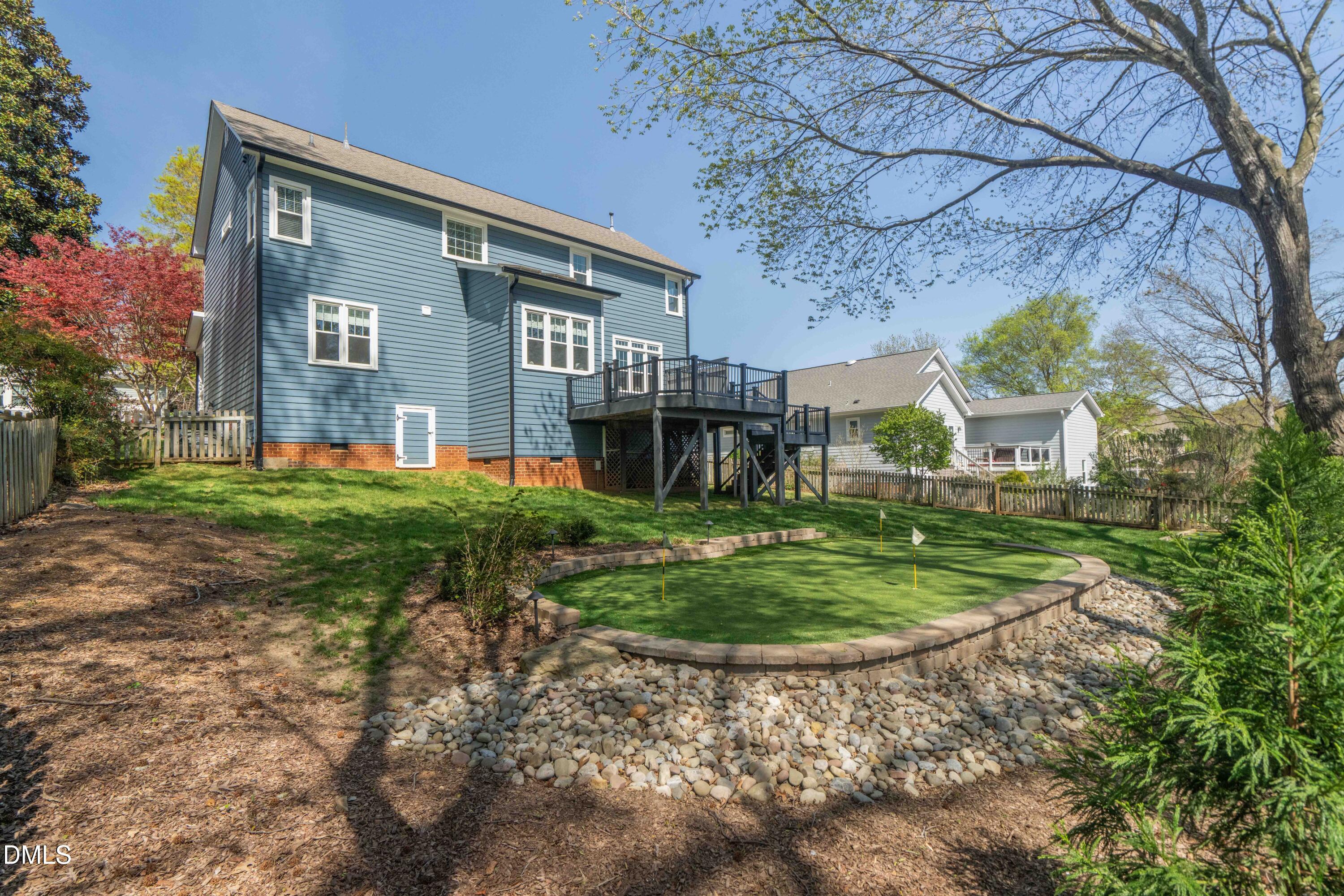 1512 Cooper Falls Lane Raleigh, NC 27614 - Photo 59 of 64 a front view of a house with a yard