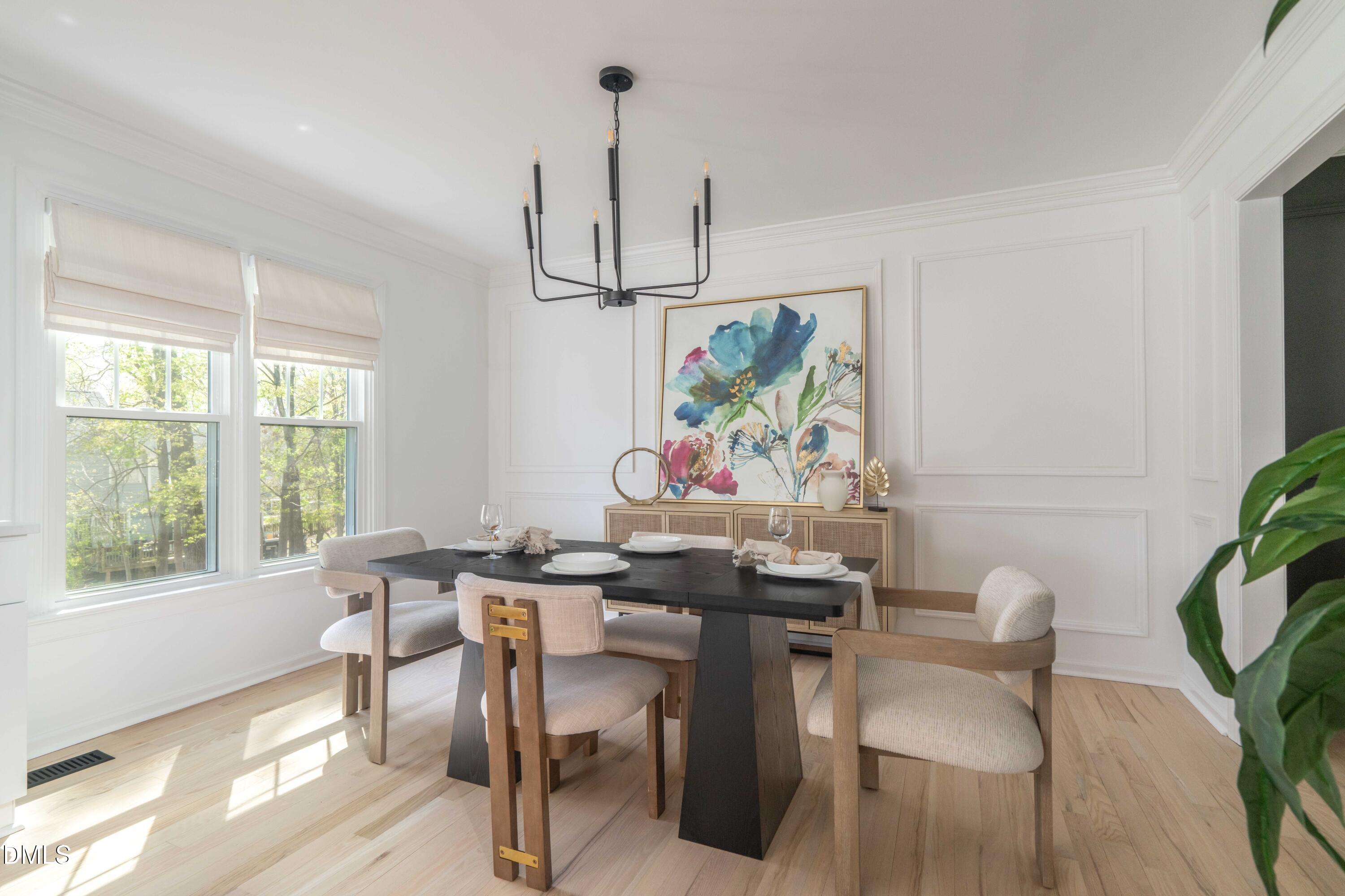 1512 Cooper Falls Lane Raleigh, NC 27614 - Photo 8 of 64 a view of a dining room with furniture window and outside view