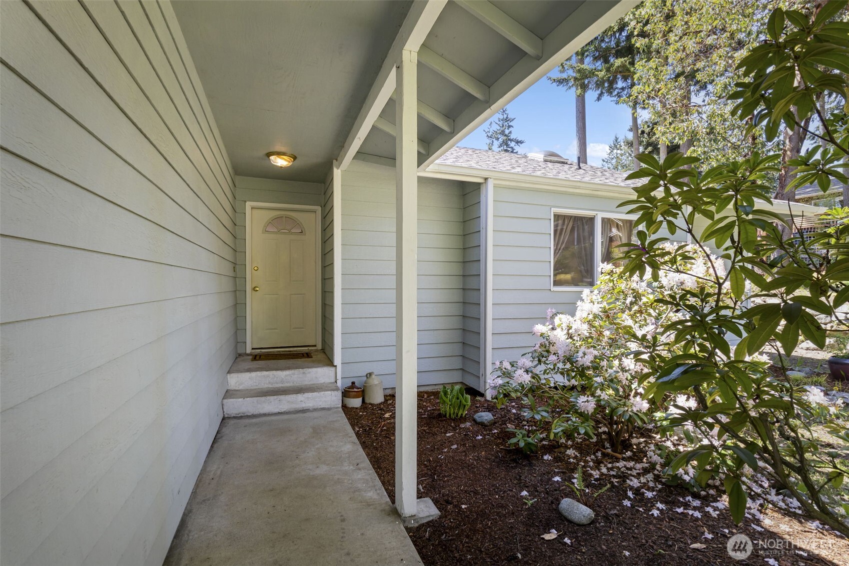 919 43rd Street Port Townsend, WA 98368 - Photo 21 of 28 a view of a house with a small backyard