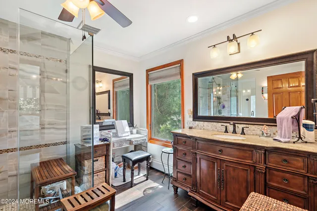 a kitchen with sink and view of living room