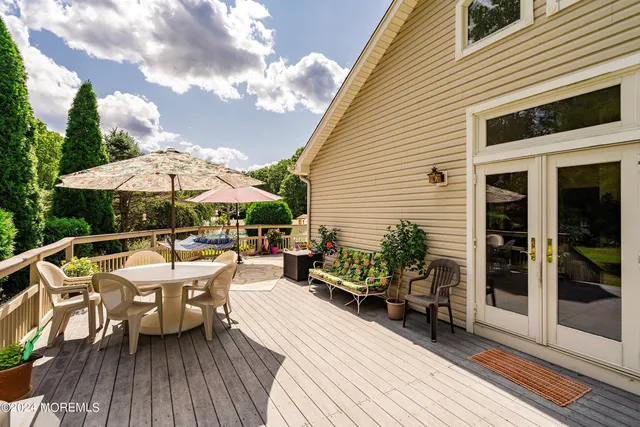 a view of a house with sitting area and furniture