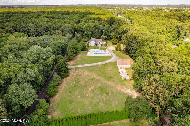 a view of a yard with an outdoor space