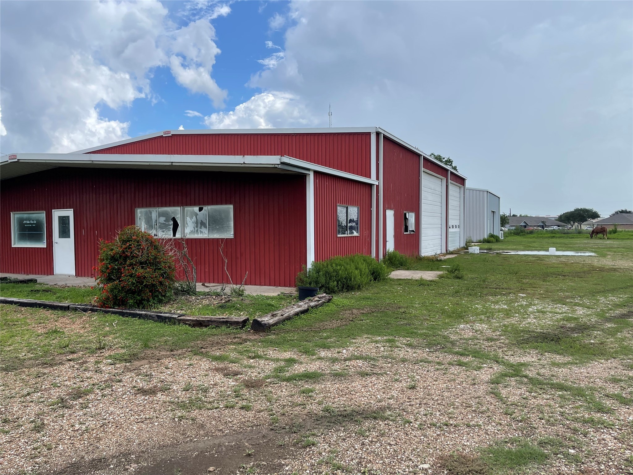 204 Glen Flora Road Eagle Lake, TX 77434 - Photo 6 of 6 a view of a house with a yard