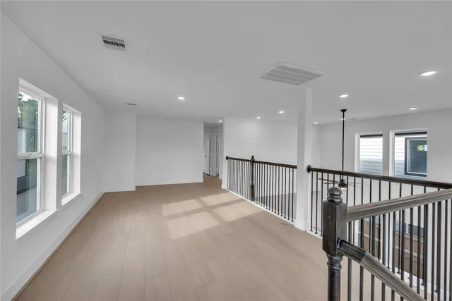 wooden floor and windows in a room