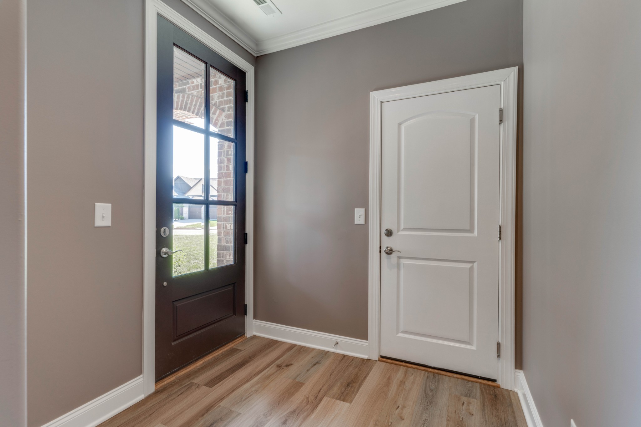 449 West Foxrun Springfield, TN 37172 - Photo 4 of 27 wooden floor in an empty room and a window