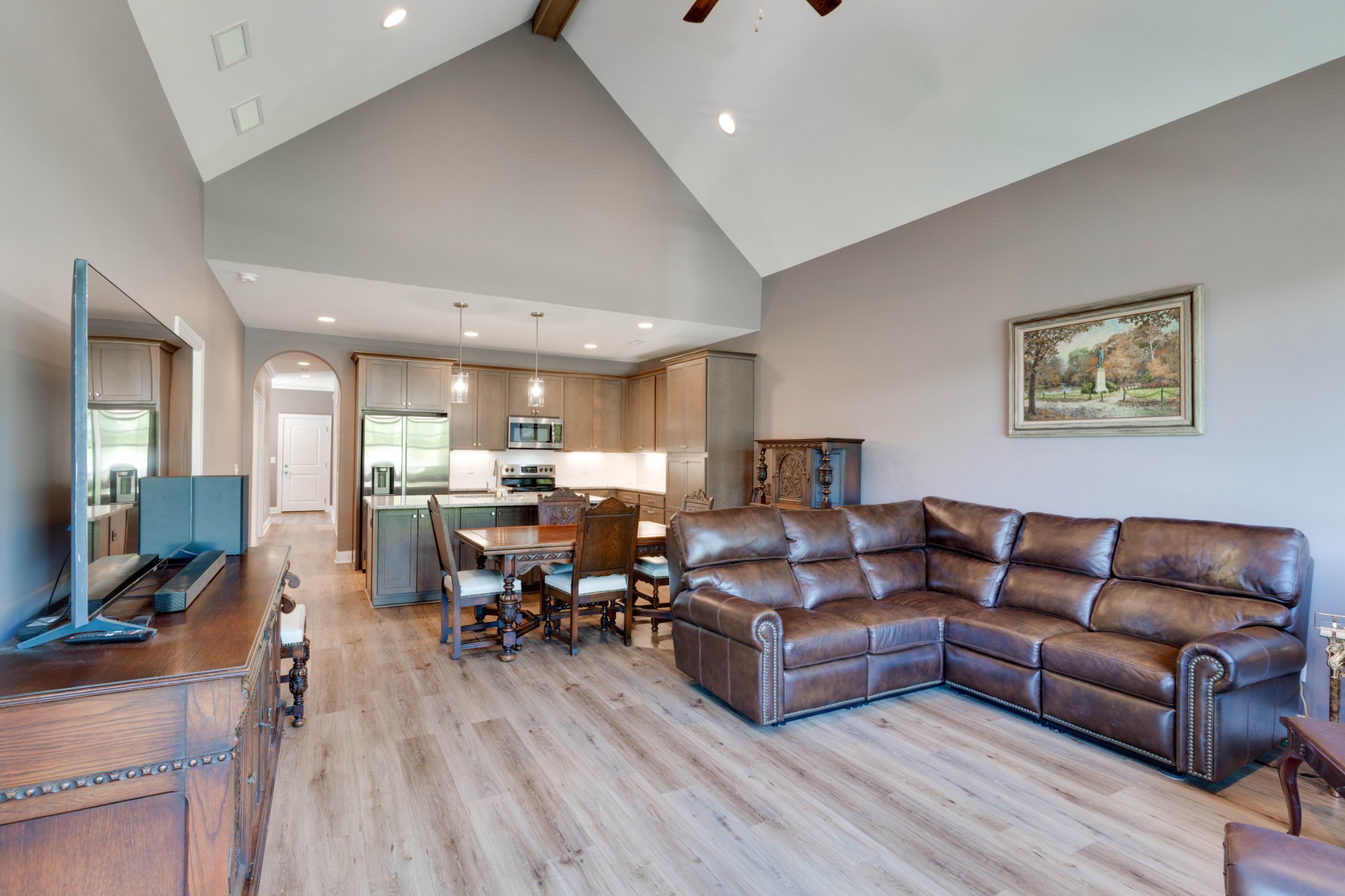 449 West Foxrun Springfield, TN 37172 - Photo 6 of 27 a living room with furniture flat screen tv and a fireplace