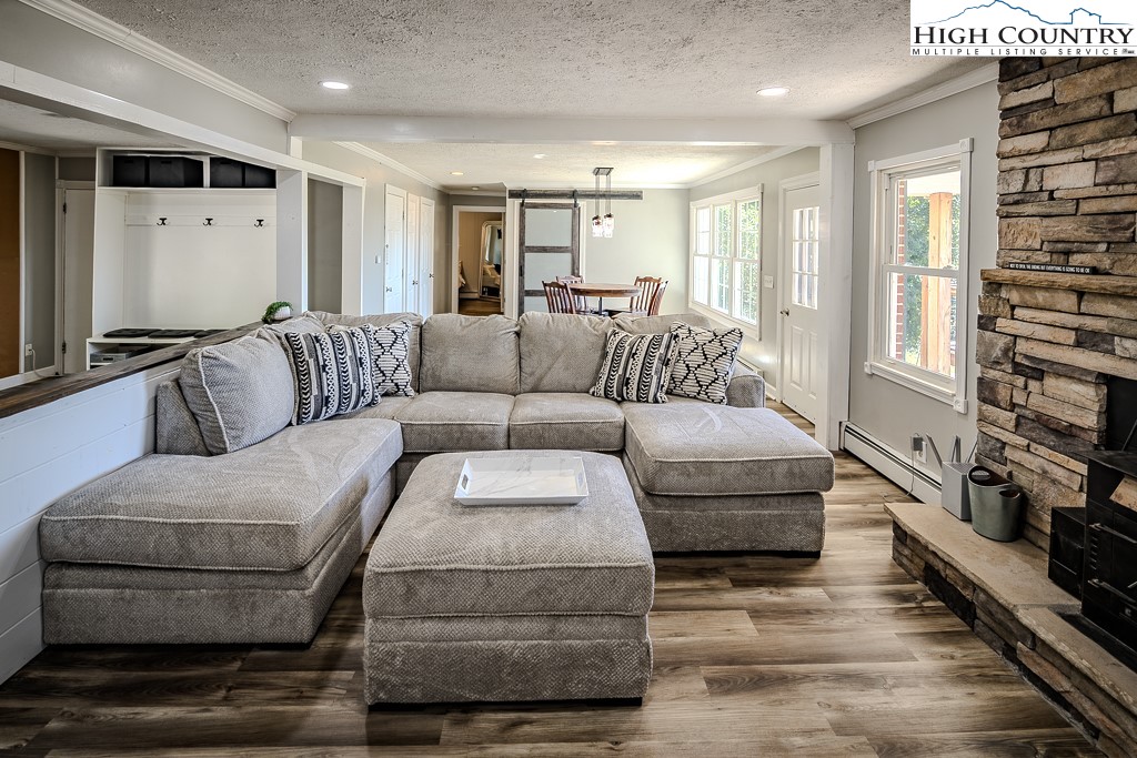 640 Fairview Heights Boone, NC 28607 - Photo 12 of 50 a living room with furniture and a flat screen tv