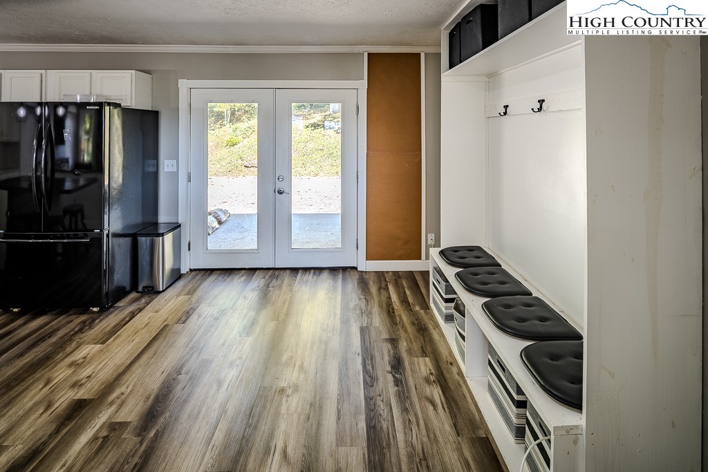 640 Fairview Heights Boone, NC 28607 - Photo 24 of 50 a view of a living room with wooden floor and a window