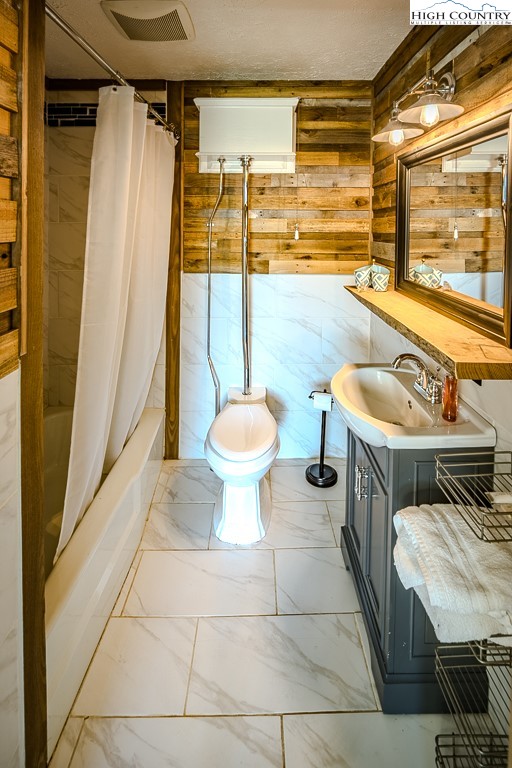640 Fairview Heights Boone, NC 28607 - Photo 29 of 50 a bathroom with a sink and a toilet