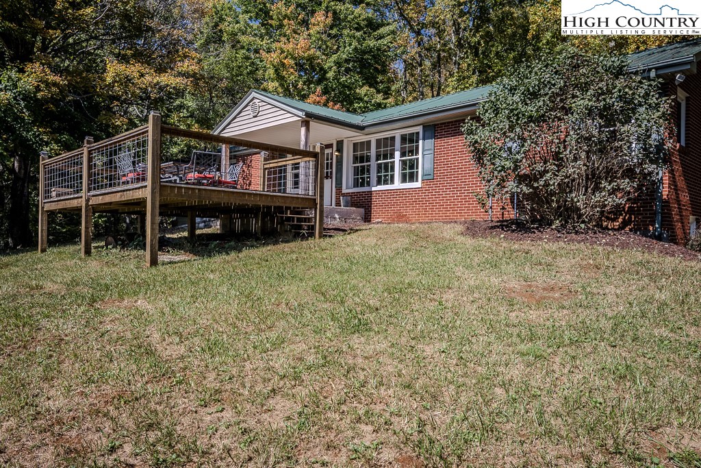 640 Fairview Heights Boone, NC 28607 - Photo 3 of 50 a view of a house with backyard and sitting area