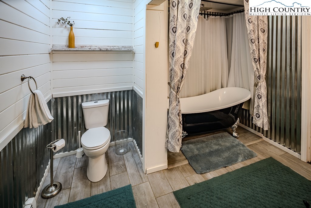 640 Fairview Heights Boone, NC 28607 - Photo 31 of 50 a bathroom with a toilet and a shower