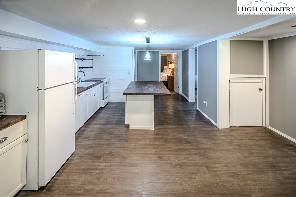 640 Fairview Heights Boone, NC 28607 - Photo 41 of 50 a view of a kitchen with a sink and refrigerator