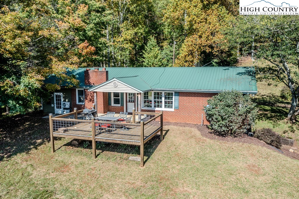 640 Fairview Heights Boone, NC 28607 - Photo 6 of 50 an aerial view of a house with swimming pool and sitting area