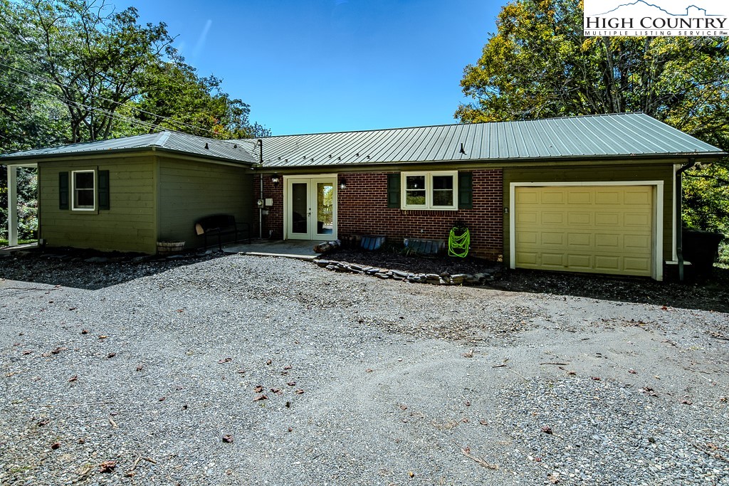 640 Fairview Heights Boone, NC 28607 - Photo 8 of 50 a view of a house with a backyard