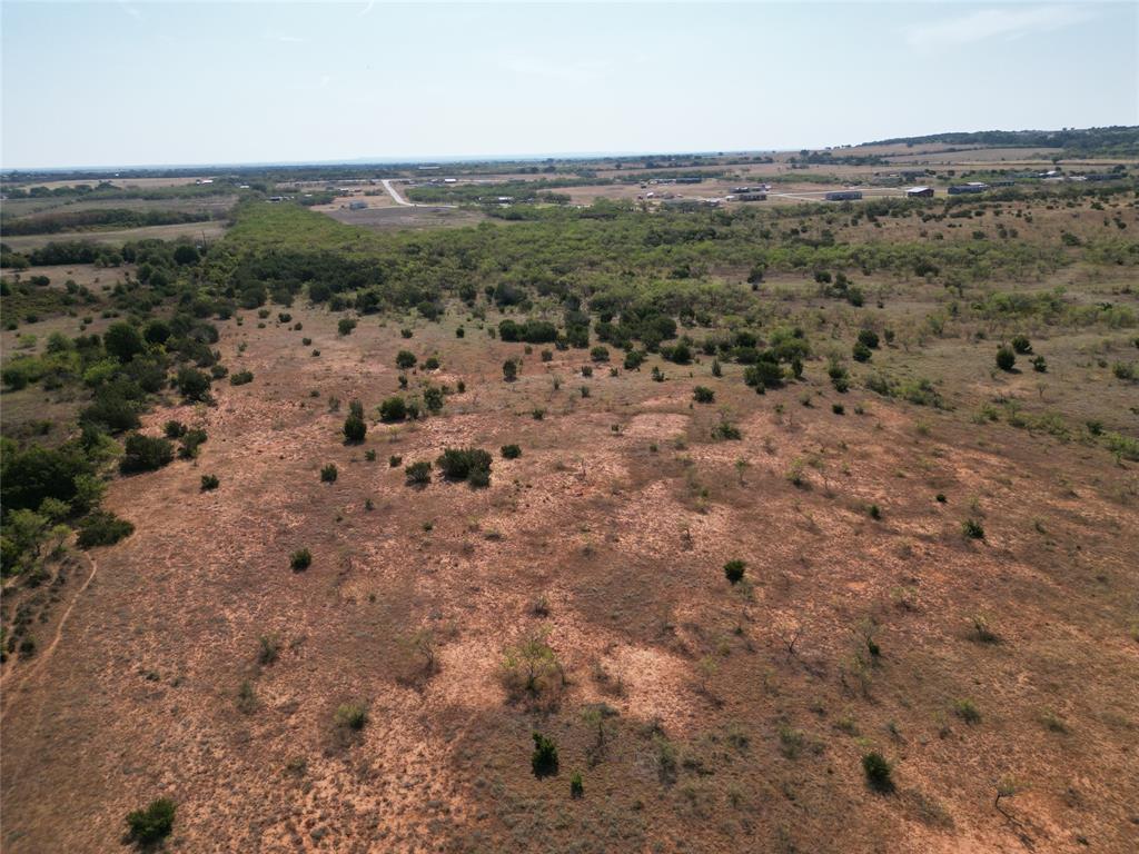 Tbd Tbd Easement Clyde, TX 79510 - Photo 4 of 9 a view of a field with trees in the background