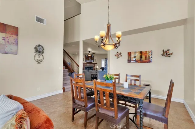 a bathroom with a sink a mirror a toilet and a shower