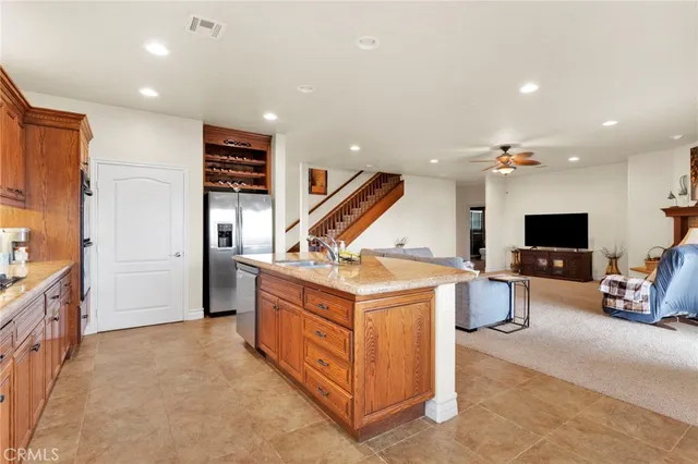 a bathroom with a tub a sink and mirrors