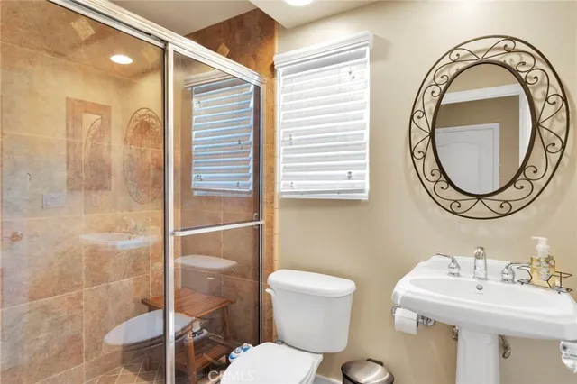 a view of a living room and a floor to ceiling window