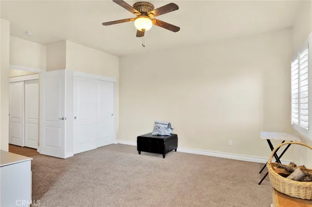 a view of a swimming pool with a lounge chairs