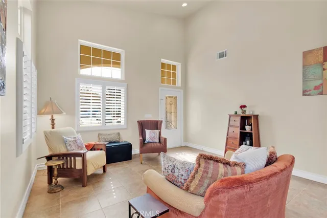 a kitchen with stainless steel appliances granite countertop a sink a stove and cabinets