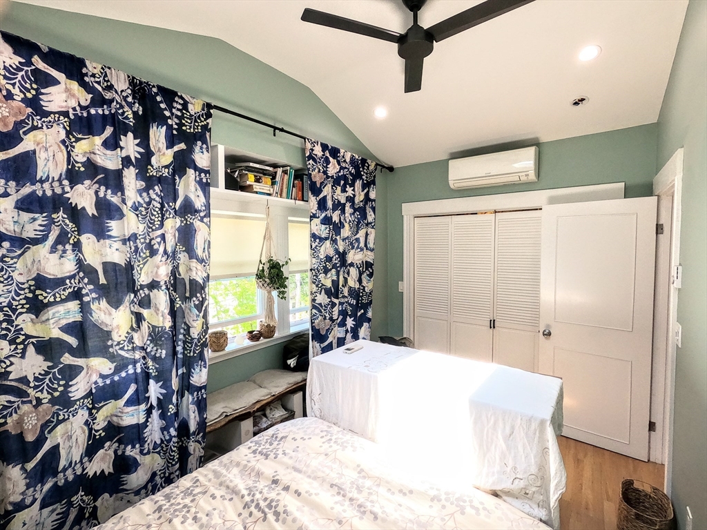 12 Searle Road, Unit 12 Boston, MA 02132 - Photo 34 of 35 a bedroom with a bed and a window