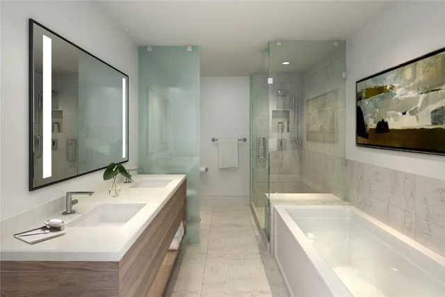 a kitchen with a refrigerator a sink and chairs