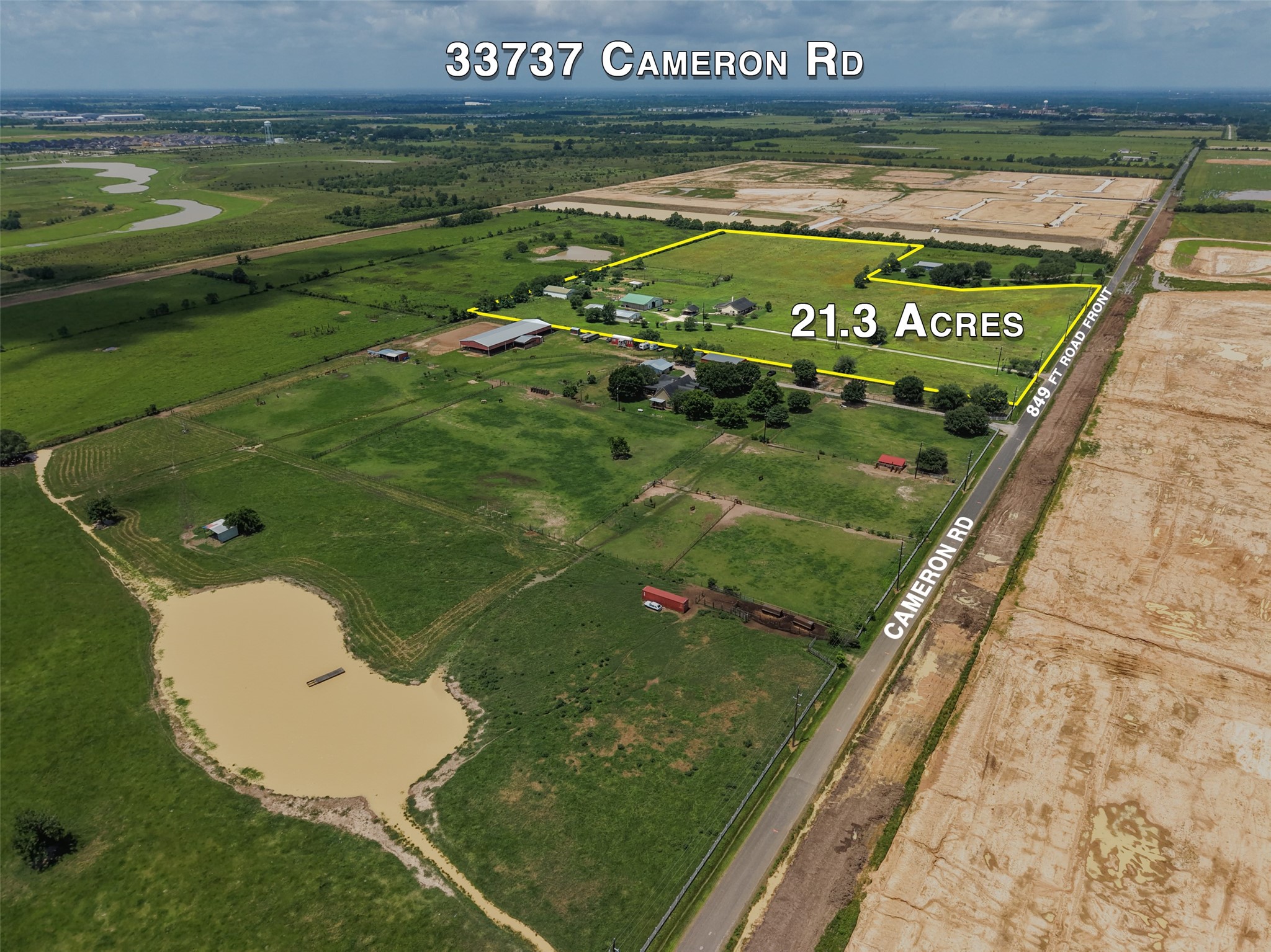 33737 Cameron Road Waller, TX 77484 - Photo 16 of 24 21.3-acre property located at 33737 Cameron Rd, featuring open green fields, and road frontage. Ideal for agricultural use or development.