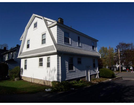 31 Reedsdale Road Milton, MA 02186 - Photo 3 of 10 a front view of a house with a yard