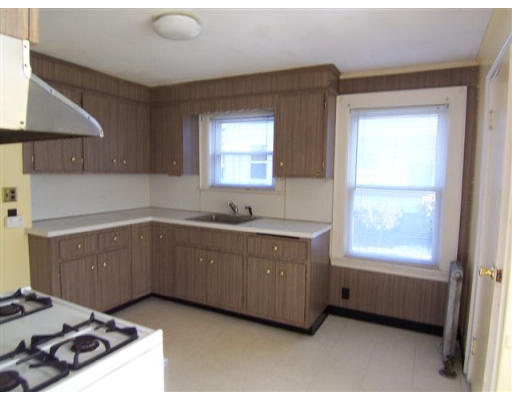 31 Reedsdale Road Milton, MA 02186 - Photo 7 of 10 a kitchen with a sink stove and window