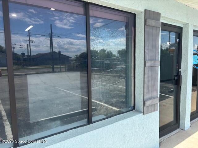 282 Clearlake Road Cocoa, FL 32922 - Photo 1 of 11 a bathroom with a glass shower door
