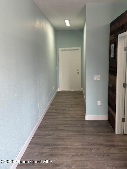 282 Clearlake Road Cocoa, FL 32922 - Photo 5 of 11 a view of a hallway with wooden floor