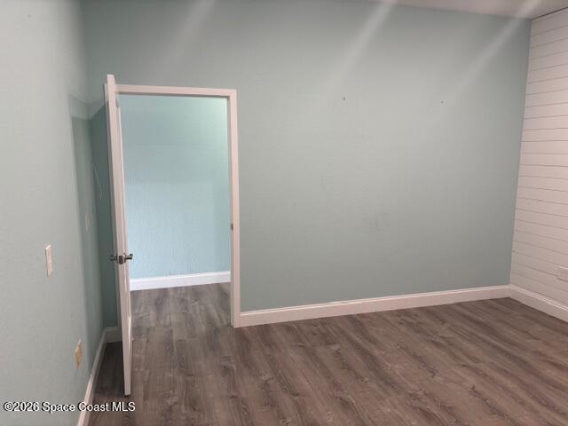 282 Clearlake Road Cocoa, FL 32922 - Photo 9 of 11 a view of room with wooden floor