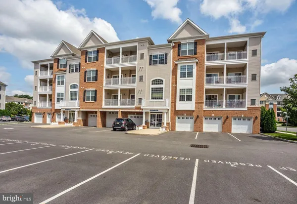 a front view of a building with a street
