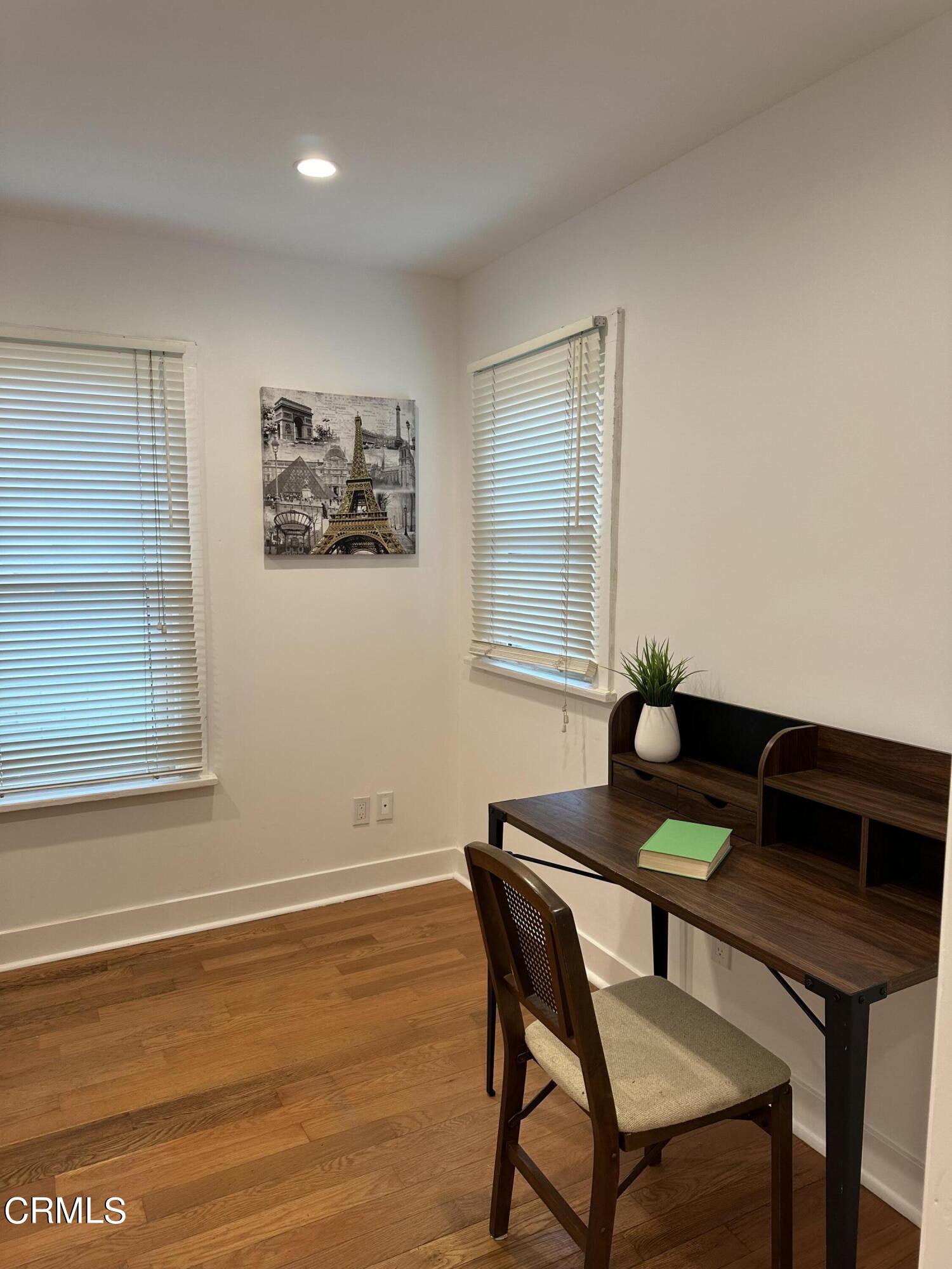 117 North Alta Vista Avenue Monrovia, CA 91016 - Photo 11 of 23 a view of a workspace with furniture and a window