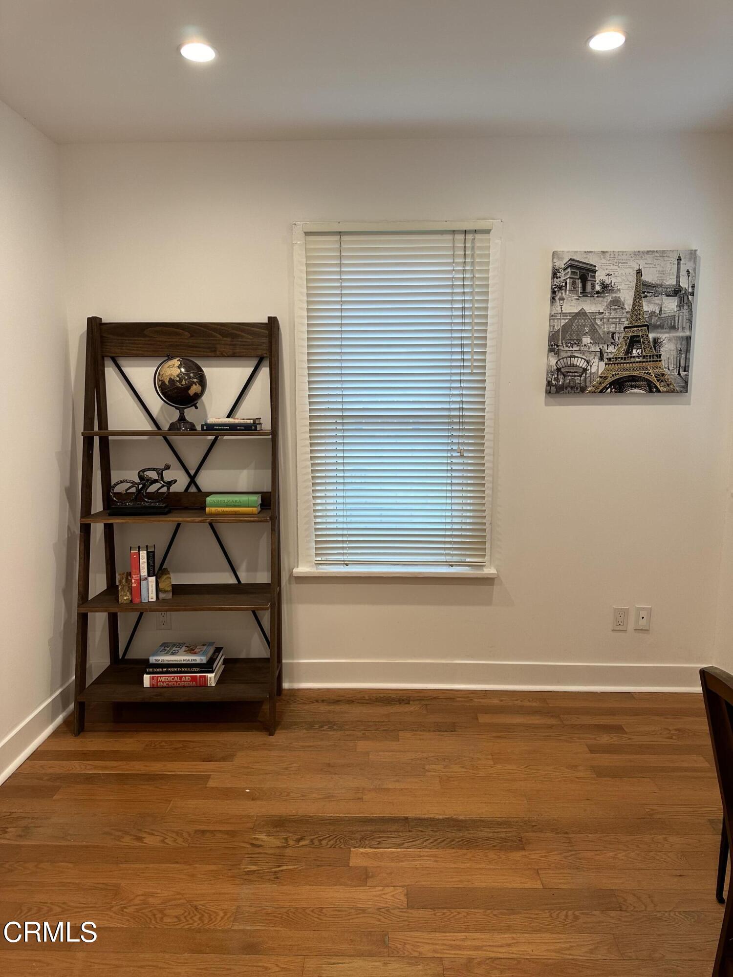 117 North Alta Vista Avenue Monrovia, CA 91016 - Photo 10 of 23 a view of room with window and wooden floor