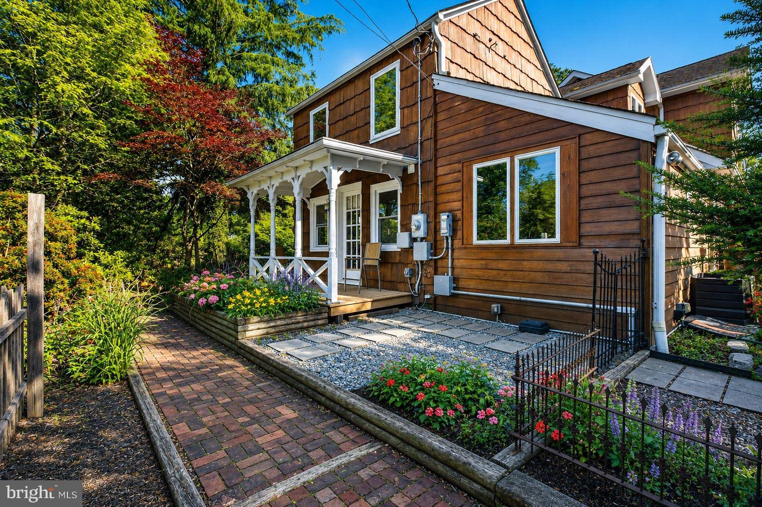 498 Perrineville Road Robbinsville, NJ 08691 - Photo 3 of 59 a view of a house with potted plants