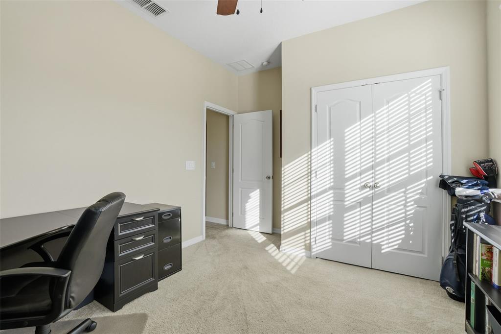 1154 Fountain Coin Loop Orlando, FL 32828 - Photo 23 of 48 a view of workspace with furniture and a window