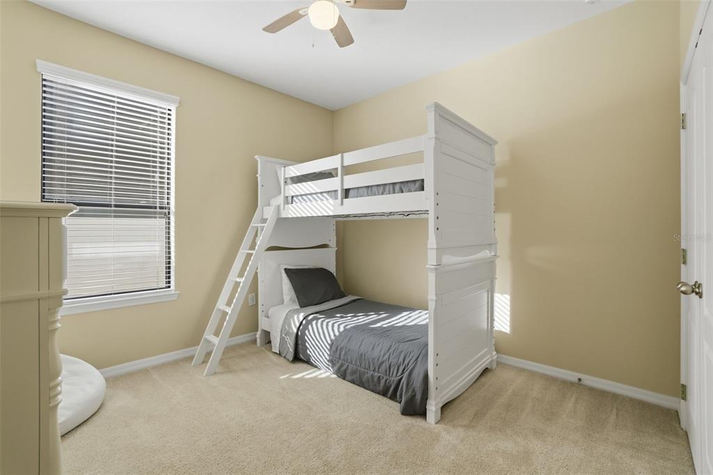 1154 Fountain Coin Loop Orlando, FL 32828 - Photo 25 of 48 a room with a bed and a window