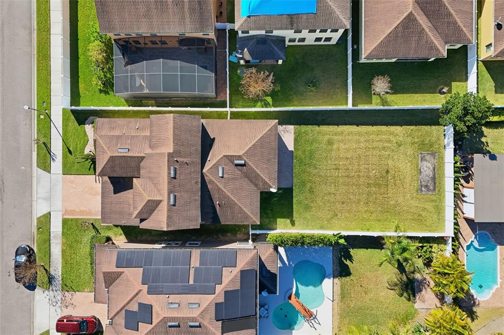 1154 Fountain Coin Loop Orlando, FL 32828 - Photo 41 of 48 an aerial view of residential houses with outdoor space
