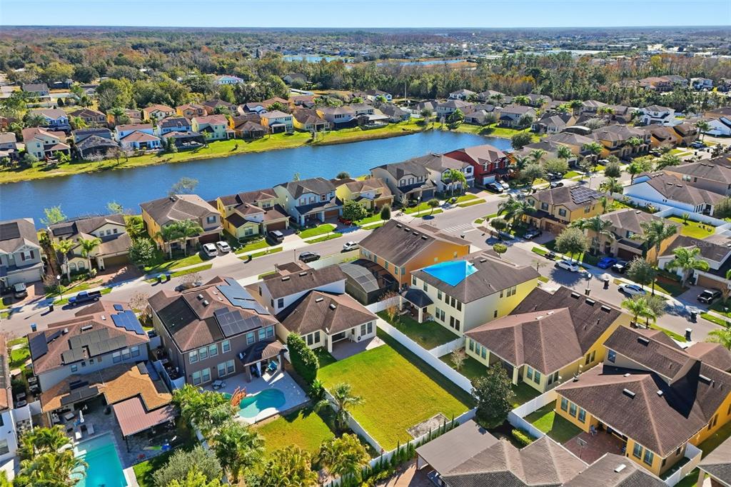 1154 Fountain Coin Loop Orlando, FL 32828 - Photo 45 of 48 an aerial view of residential houses with outdoor space