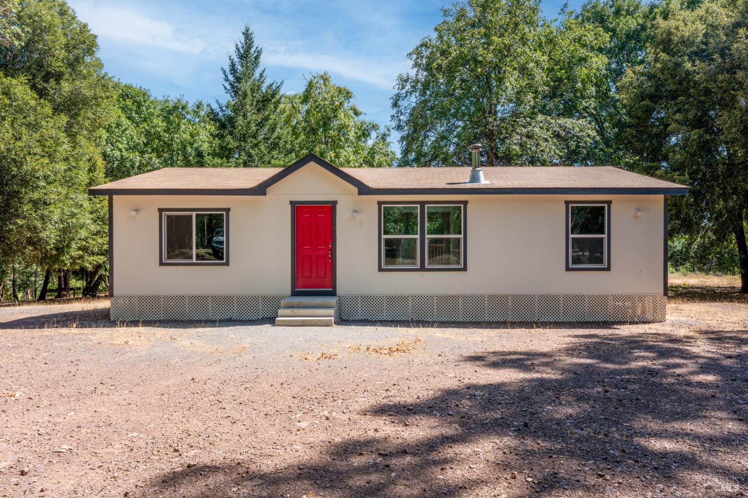 78611 Mina Road Covelo, CA 95428 - Photo 15 of 24 a front view of a house with a yard