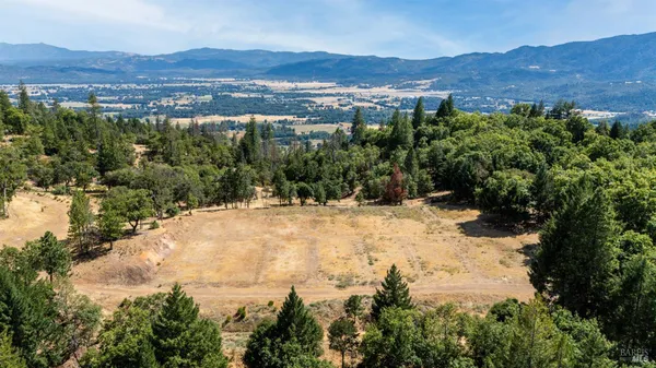 an aerial view of mountain with outdoor space