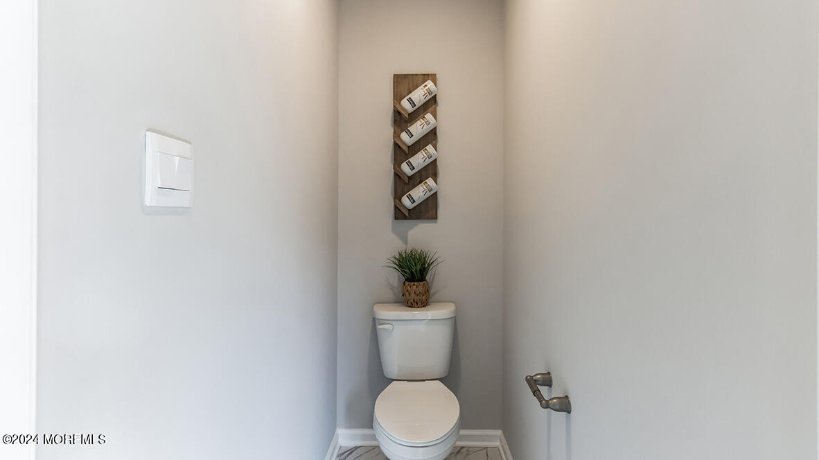 36 Penny Lane Neptune, NJ 07753 - Photo 18 of 20 a bathroom with a toilet and a sink