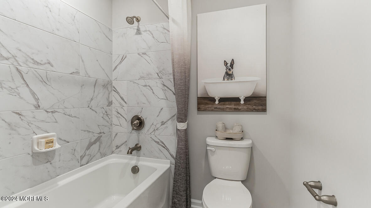 36 Penny Lane Neptune, NJ 07753 - Photo 19 of 20 a bathroom with a sink a toilet and a bathtub