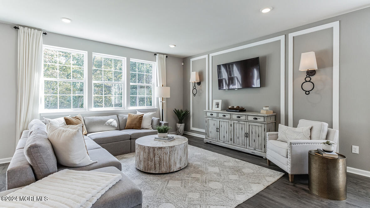 36 Penny Lane Neptune, NJ 07753 - Photo 4 of 20 a living room with furniture and a large window