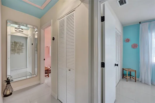 a view of a bathroom with a shower and a sink