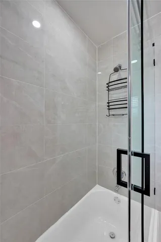 a bathroom with a bathtub