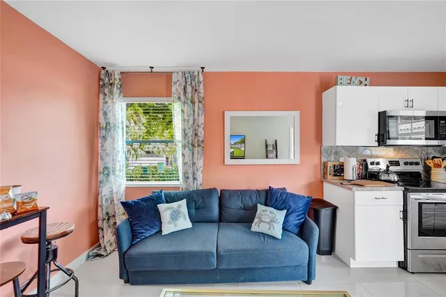 a living room with furniture and a window