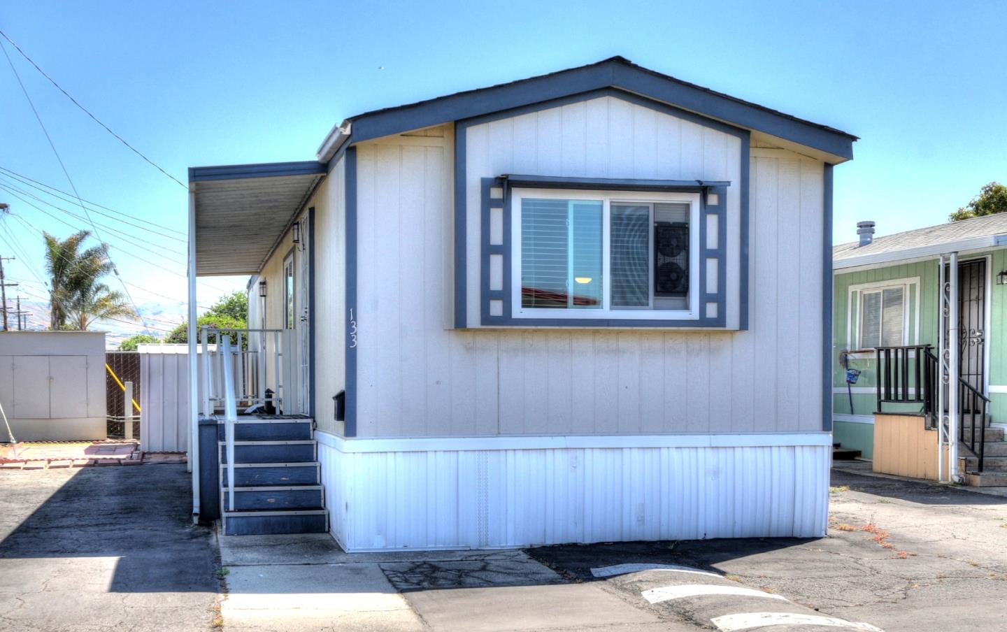1500 Virginia Place, Unit 133 San Jose, CA 95116 - Photo 1 of 15 a front view of a house with stairs