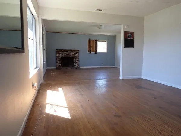a view of livingroom with furniture and window